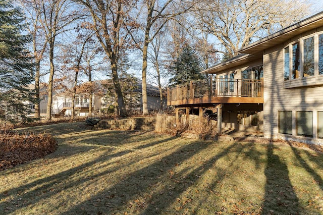 view of yard with a wooden deck