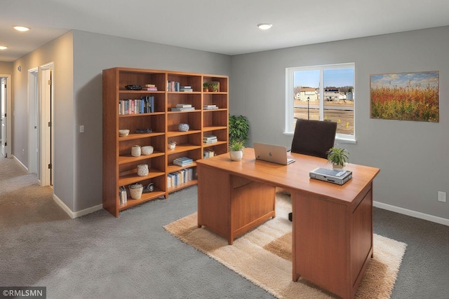 office area with recessed lighting, baseboards, and light carpet