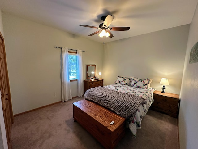 bedroom with a ceiling fan, light carpet, and baseboards