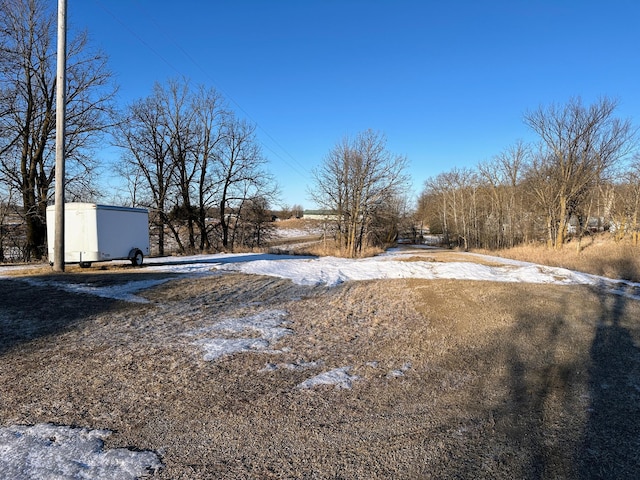 view of yard covered in snow