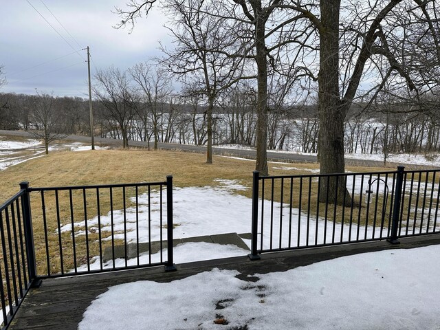 view of snow covered deck