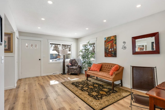 interior space with visible vents, baseboards, light wood-style flooring, and recessed lighting