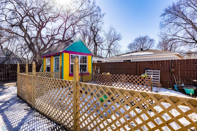 view of outbuilding with fence private yard and an outbuilding