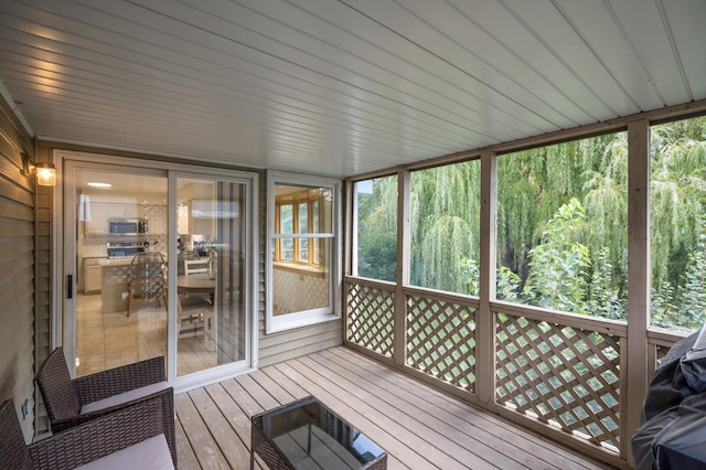 unfurnished sunroom with a healthy amount of sunlight