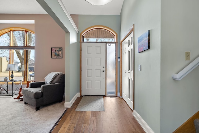 3220 Highlands Rd, Brooklyn Park, MN 55443 - foyer featuring hardwood / wood-style flooring and baseboards