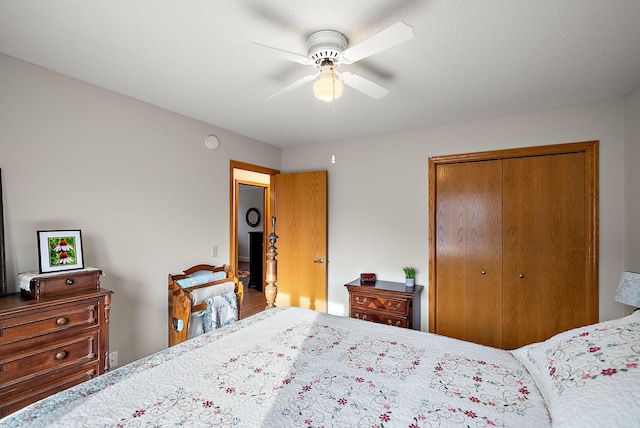 3220 Highlands Rd, Brooklyn Park, MN 55443 - bedroom with a closet, ceiling fan, and wood finished floors