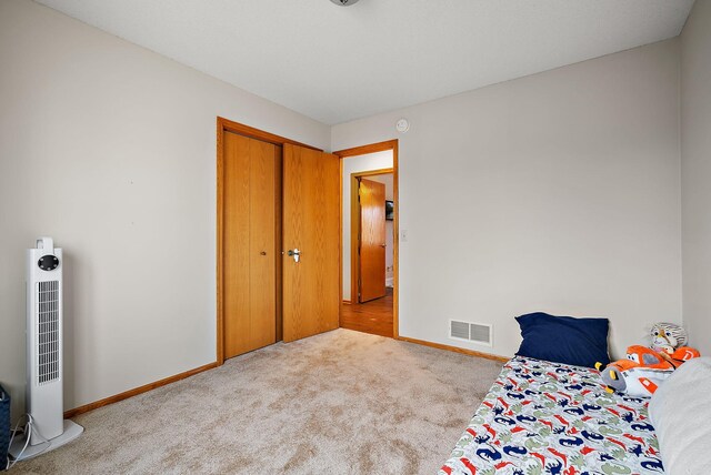3220 Highlands Rd, Brooklyn Park, MN 55443 - bedroom with carpet and a heating unit