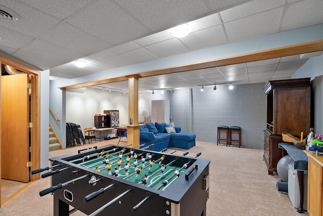 3220 Highlands Rd, Brooklyn Park, MN 55443 - recreation room with rail lighting, carpet flooring, and a paneled ceiling