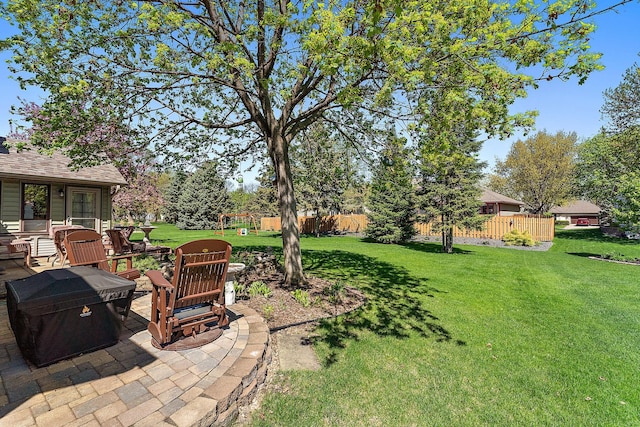 3220 Highlands Rd, Brooklyn Park, MN 55443 - view of yard featuring a patio area and a playground