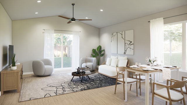 living area featuring lofted ceiling, recessed lighting, a ceiling fan, baseboards, and light wood-type flooring