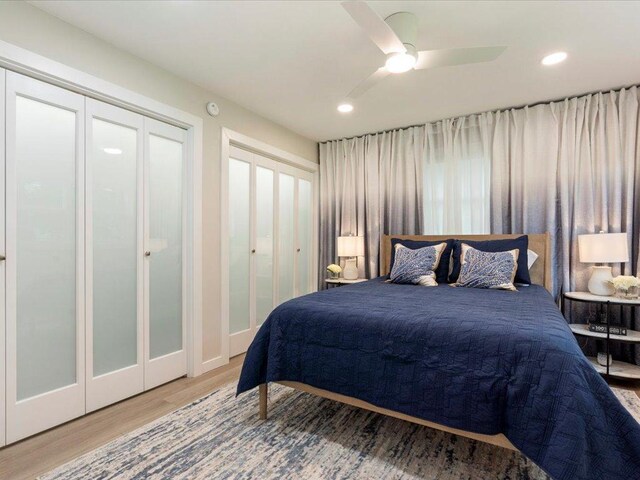 bedroom featuring recessed lighting, wood finished floors, and ceiling fan