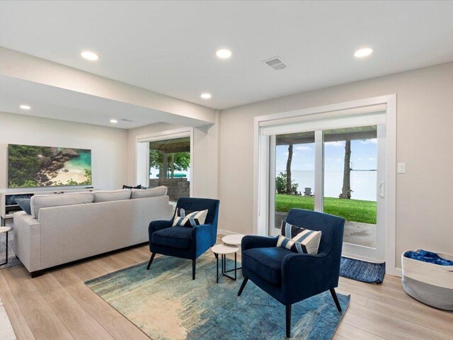 interior space featuring recessed lighting, visible vents, light wood-style floors, and a healthy amount of sunlight