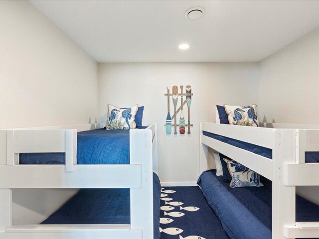 bedroom featuring recessed lighting, carpet, and baseboards