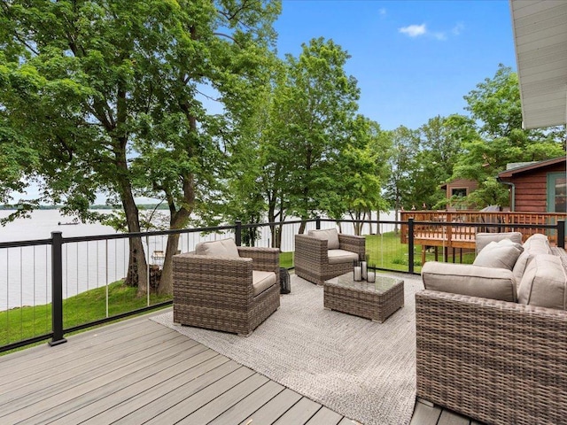 deck featuring outdoor lounge area and fence