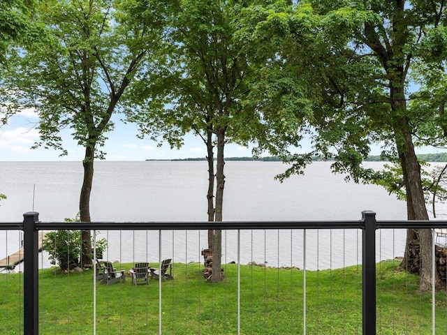 view of water feature featuring fence