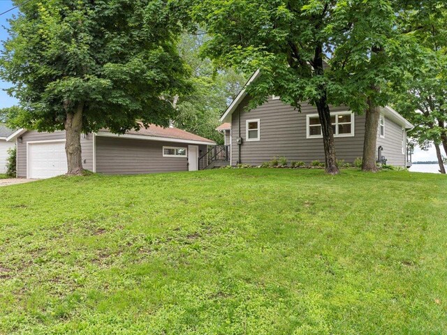 view of yard featuring a garage