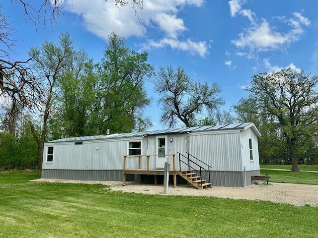 28714 County Road 112, Dieter Twp, MN 56751 - rear view of property featuring a lawn