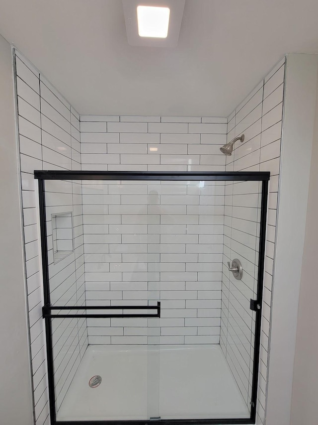 bathroom featuring a stall shower