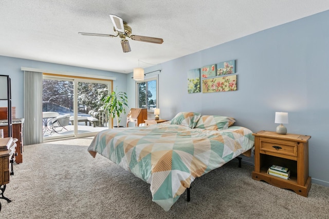 bedroom featuring carpet floors, a textured ceiling, a ceiling fan, and access to outside