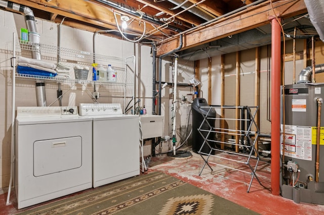 unfinished below grade area with washer and dryer and gas water heater