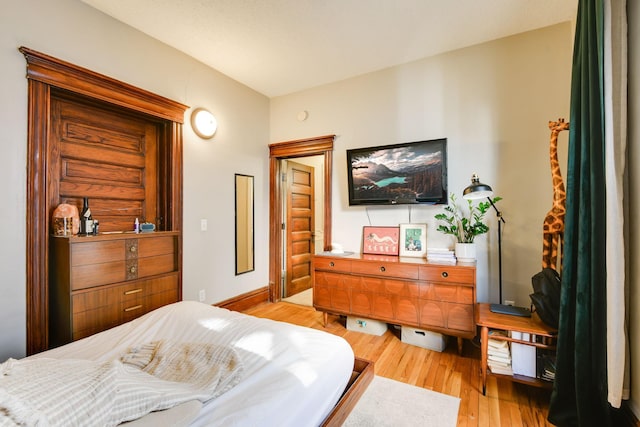 bedroom featuring light wood-type flooring