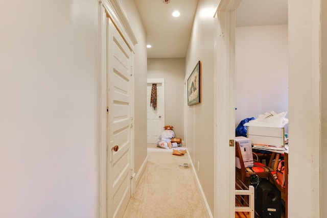 hall with baseboards, carpet flooring, and recessed lighting