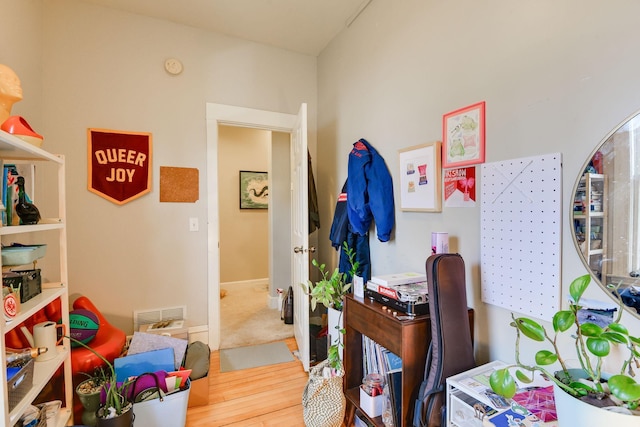 rec room featuring wood finished floors and visible vents