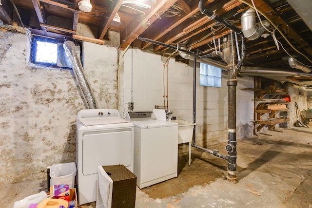 below grade area with washer and clothes dryer