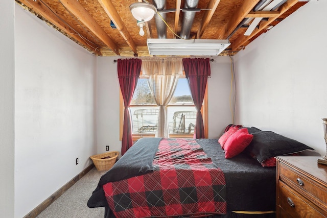 carpeted bedroom with baseboards