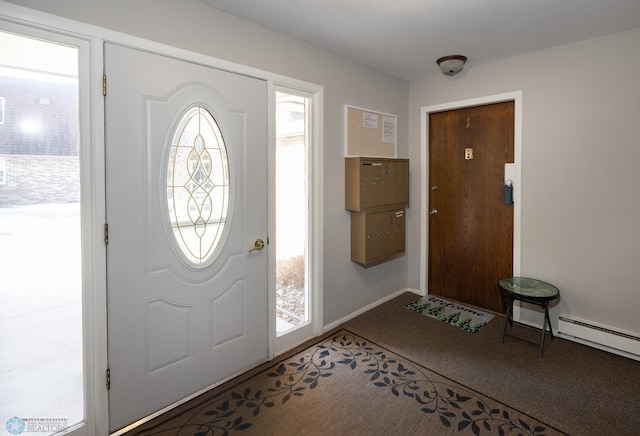 foyer with carpet flooring