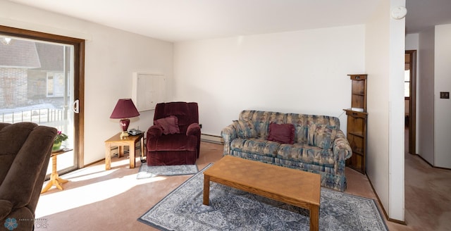 carpeted living room featuring a wealth of natural light and a baseboard radiator