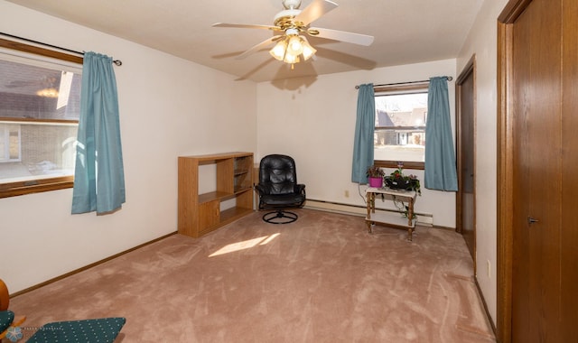 unfurnished room with ceiling fan, baseboards, carpet floors, and a baseboard radiator