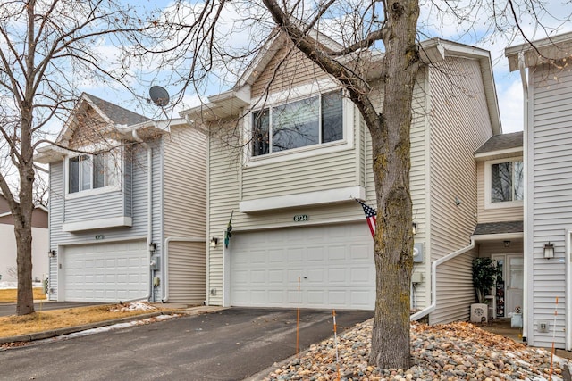 view of front of home with an attached garage and driveway