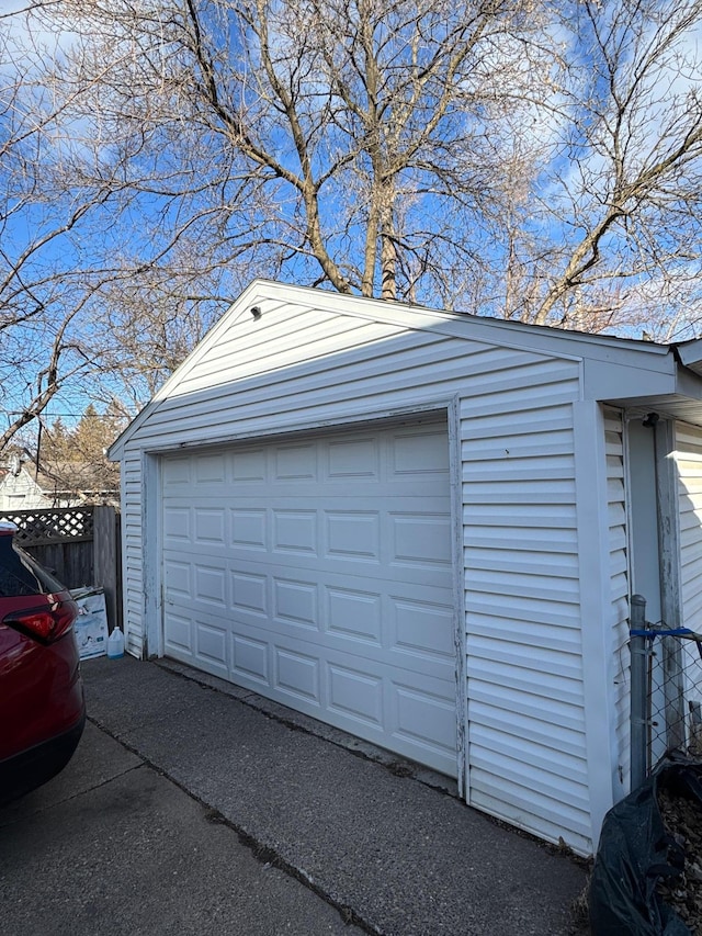 garage featuring fence