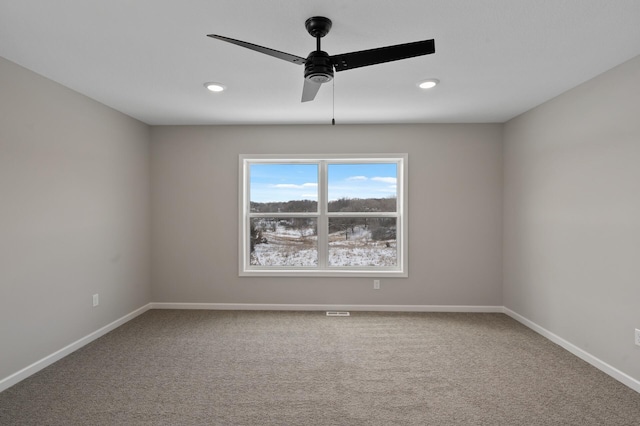 unfurnished room featuring ceiling fan, recessed lighting, carpet flooring, and baseboards