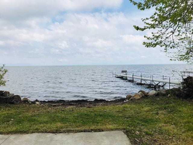 view of dock with a water view