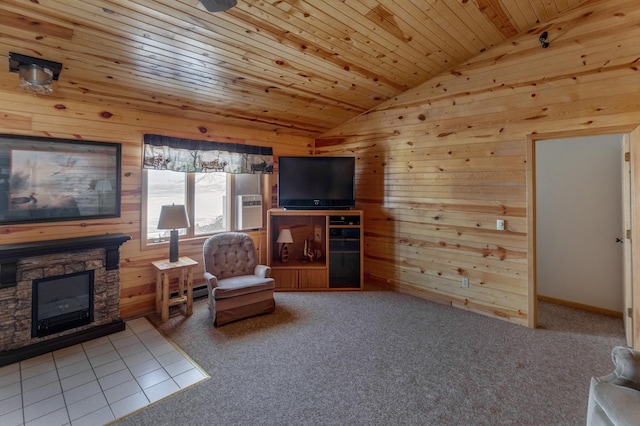 carpeted living room with vaulted ceiling, a stone fireplace, wood ceiling, and wooden walls