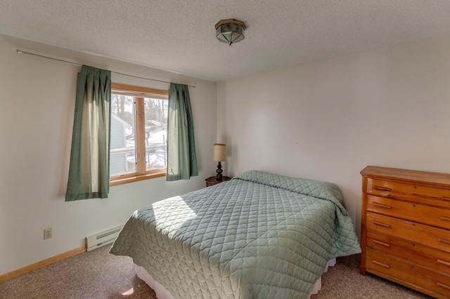 carpeted bedroom with a baseboard radiator, a textured ceiling, and baseboards