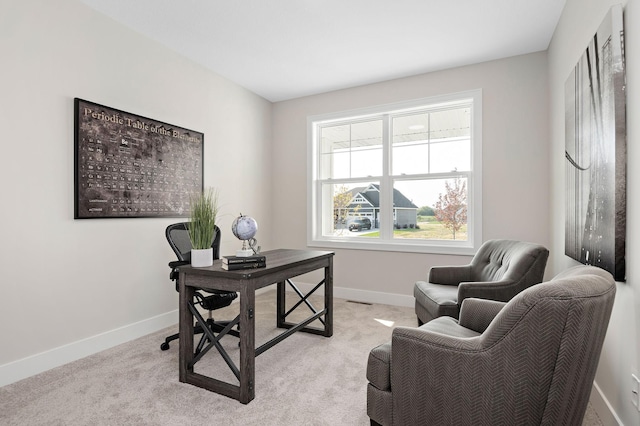 office area with baseboards and light colored carpet