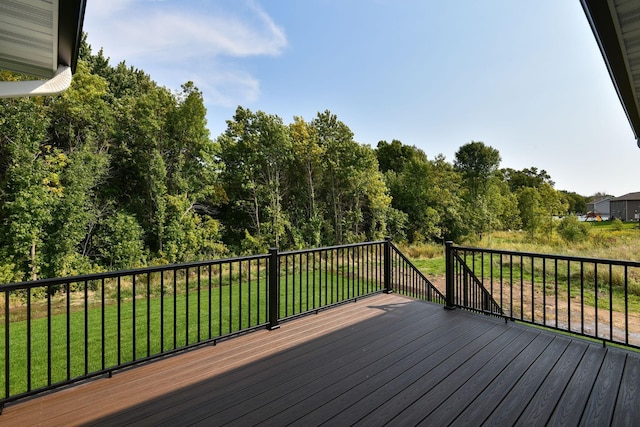 deck featuring a yard