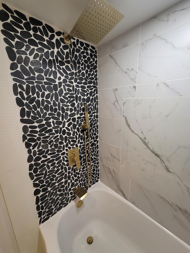 bathroom with shower / bathing tub combination