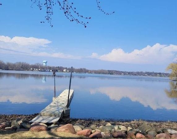 property view of water featuring a dock