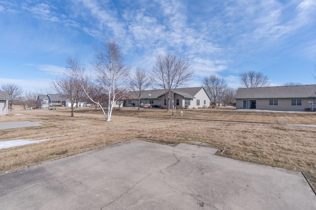 view of yard featuring a residential view