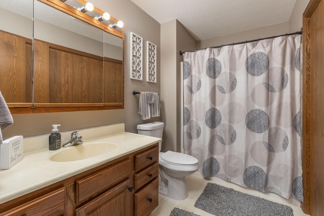 full bath featuring a textured ceiling, toilet, tile patterned floors, vanity, and a shower with curtain