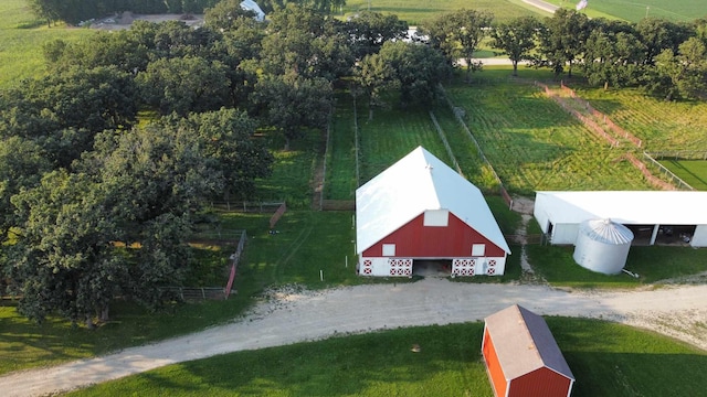 birds eye view of property featuring a rural view