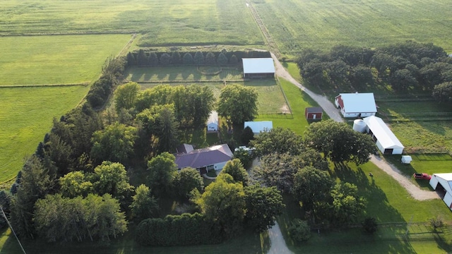 birds eye view of property with a rural view