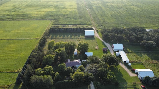 birds eye view of property with a rural view