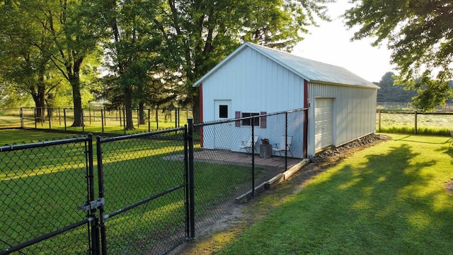 view of outdoor structure featuring an outbuilding and fence