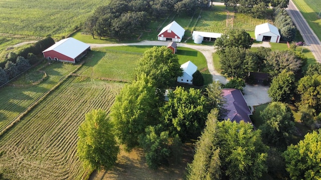 birds eye view of property featuring a rural view