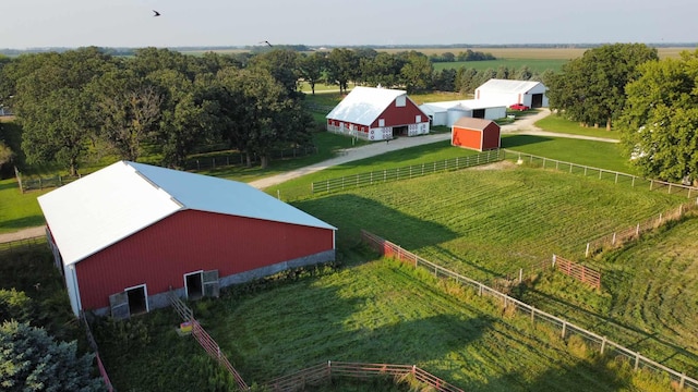 birds eye view of property featuring a rural view